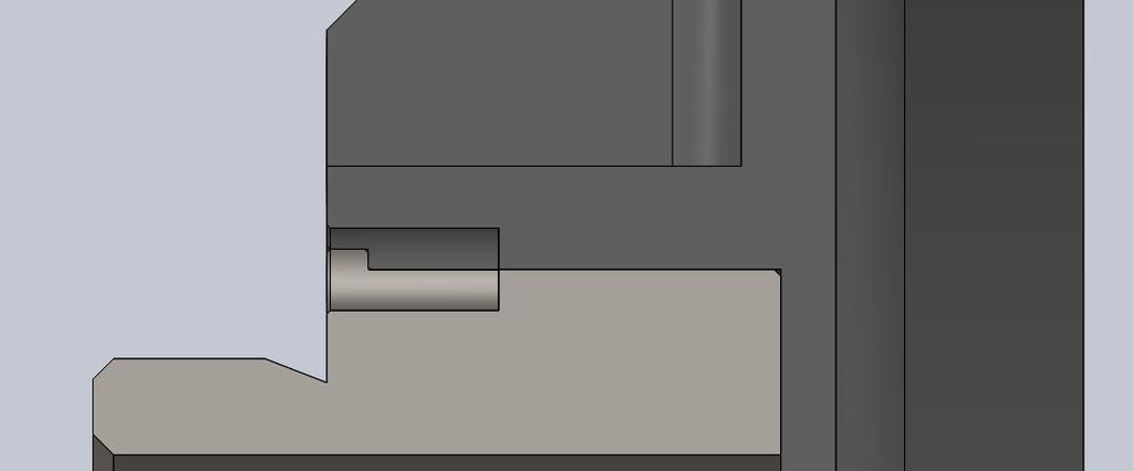 vzmetni zatič. 10 mm Slika 3.33: Pozicionirni rob na pokrovu elektromotorja.
