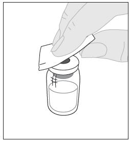 4. Obrišite zgornji del viale z enim alkoholnim zložencem (F) iz pakiranja in pustite, da se osuši na zraku.