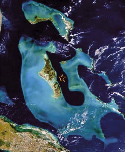 12 DECEMBER 7-2019 Slika 6: Satelitski posnetek bahamskega šelfa z globokim oceanskim jarkom (označeno z zvezdo), (nasa-gsfc).