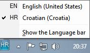 Spreminjanje jezika za vnos preko tipkovnice V vrstici z jeziki (Language bar ) kliknemo gumb Jezik vnosa (na sl. 15 je izbran hrvaški jezik), nato pa še jezik, ki ga želimo uporabiti.