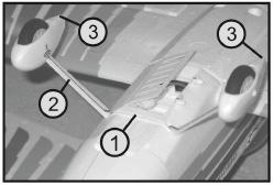 11.5 Montaža podvozja Na spodnji strani trupa se nahaja na čelni strani predala za akumulator režasto mesto za podvozje (1).