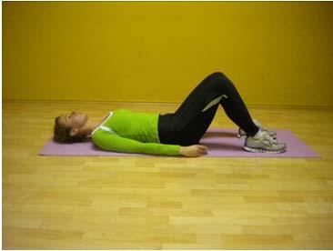 Lezite na hrbet (na blazino), pokrčite kolena in stisnite glutealne mišice.