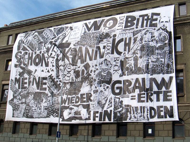 Slika 27: Thomas Kilpper: Don't Look Back, lesorez, 1998, 120 x 220 cm, nameščen na fasado umetniške akademije v Poznanu Leta 2008 Kilpper ustvarja na projektu»svetilnik na Lampedusi«.